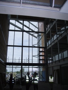 The glass art will be on the left of the curtain wall in this photo.